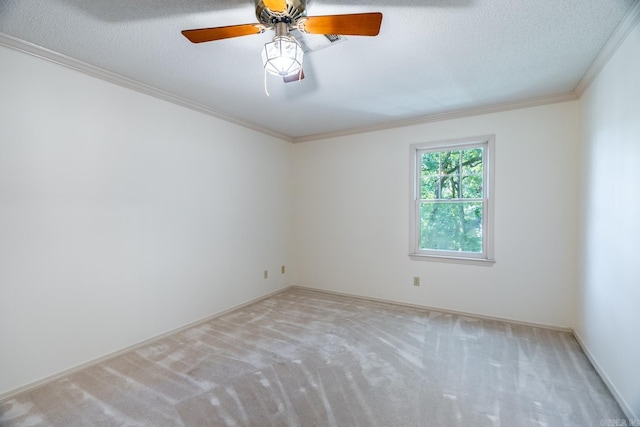 unfurnished room with light carpet, a textured ceiling, and ornamental molding