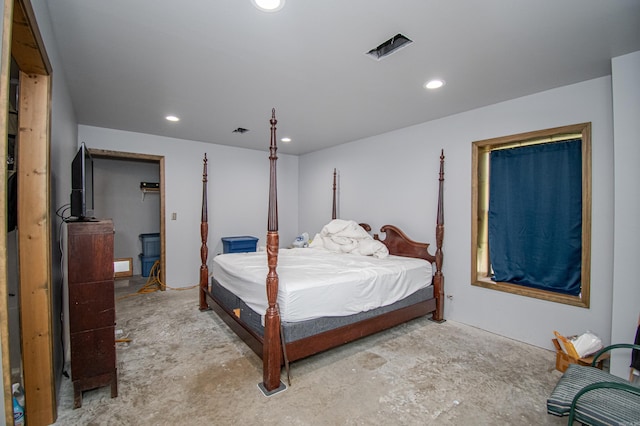 bedroom with concrete flooring