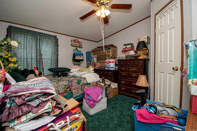 bedroom featuring ceiling fan, dark carpet, ornamental molding, and a textured ceiling