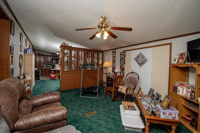 carpeted living room featuring a textured ceiling, crown molding, ceiling fan, and lofted ceiling