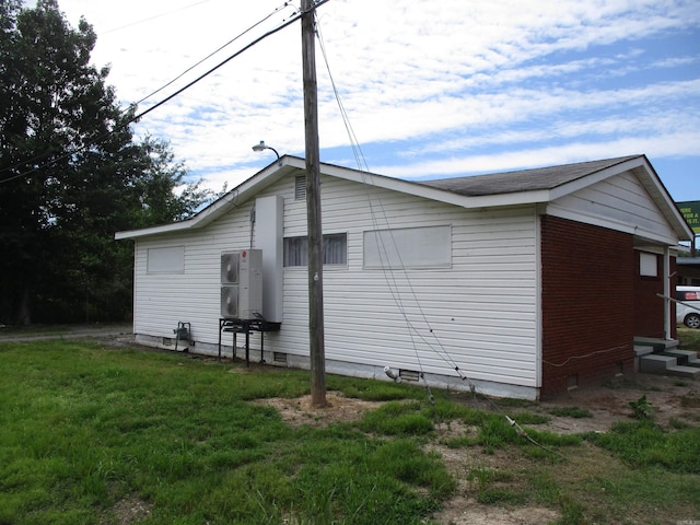 view of property exterior featuring a lawn