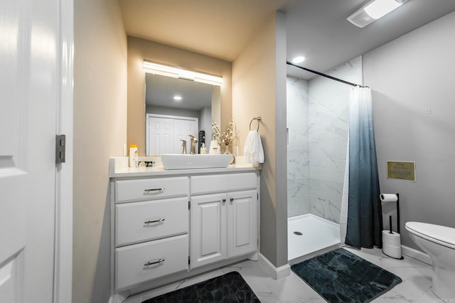 bathroom with vanity, toilet, tile patterned floors, and walk in shower