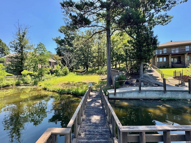 dock area featuring a water view