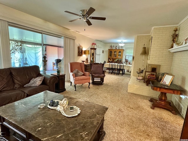 living room featuring carpet, ceiling fan, a wealth of natural light, and brick wall