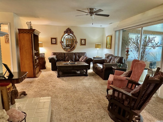 living room featuring carpet flooring and ceiling fan