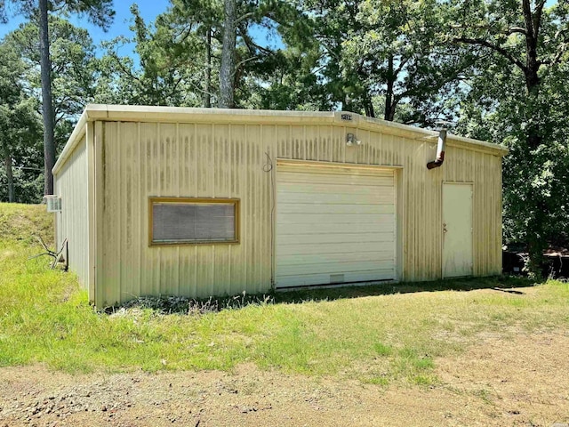 view of outdoor structure with a garage