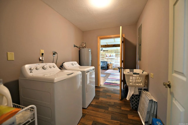 laundry room featuring dark wood-style floors, laundry area, water heater, a textured ceiling, and independent washer and dryer