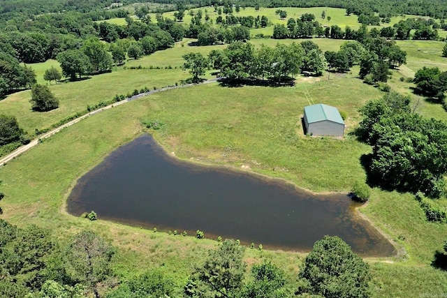 aerial view with a rural view and a water view