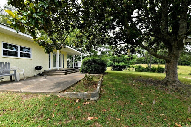 view of yard featuring a porch