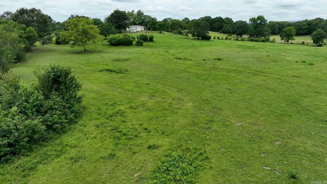 exterior space with a rural view