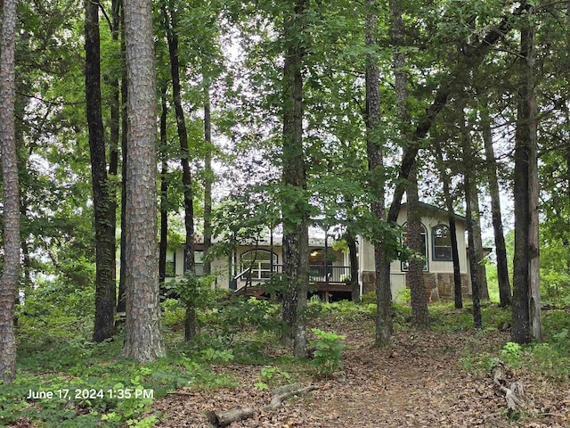 obstructed view of property featuring a deck