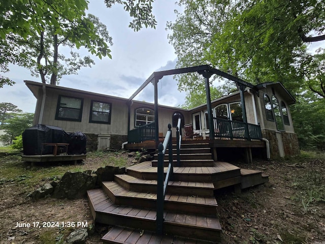 exterior space featuring a wooden deck