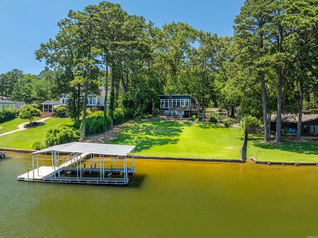 view of dock featuring a yard and a water view