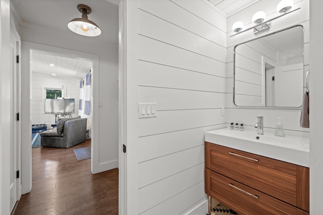 bathroom featuring vanity and hardwood / wood-style flooring