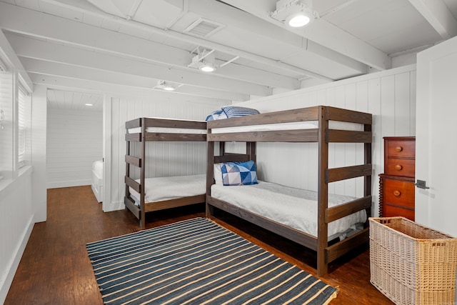 bedroom featuring dark hardwood / wood-style flooring