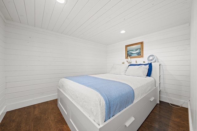 bedroom featuring wooden ceiling and dark wood-type flooring