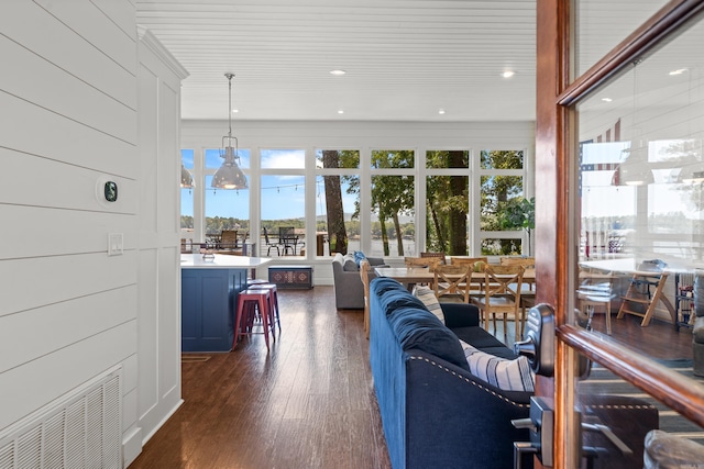 living room with dark hardwood / wood-style floors