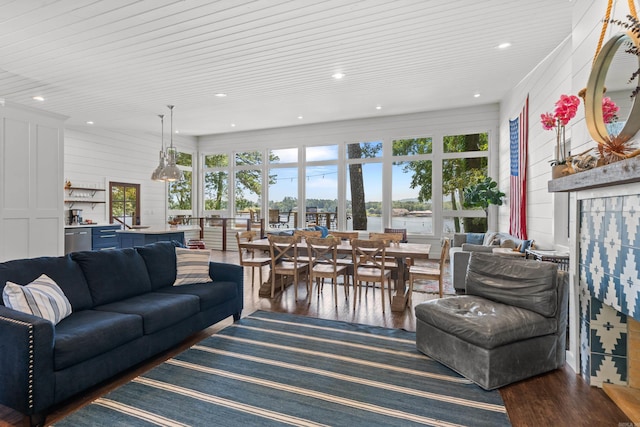 living room with dark hardwood / wood-style flooring