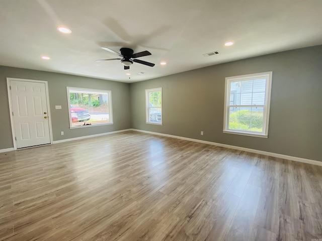 793 Lincoln Dr, Camden, AR 71701 - spare room with ceiling fan, plenty of natural light, and light hardwood / wood-style flooring