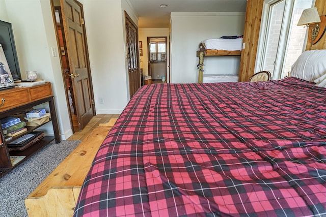 bedroom with a closet and wood-type flooring