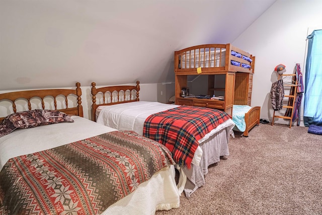 bedroom featuring carpet flooring and lofted ceiling