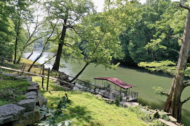 view of home's community featuring a water view