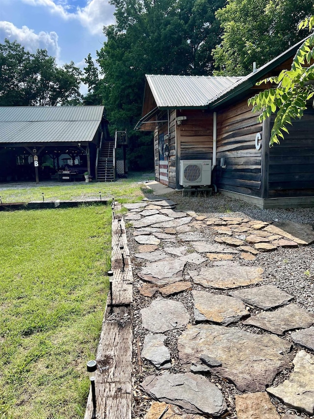 view of yard featuring ac unit