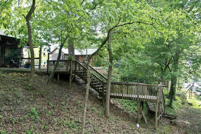 view of yard featuring a wooden deck