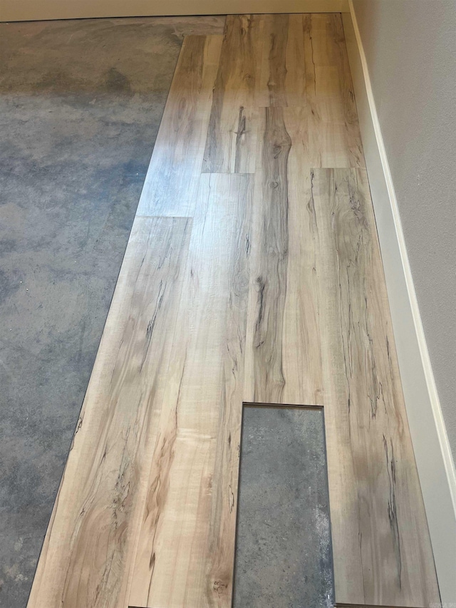 details with hardwood / wood-style flooring