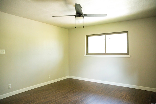 unfurnished room with ceiling fan and wood-type flooring