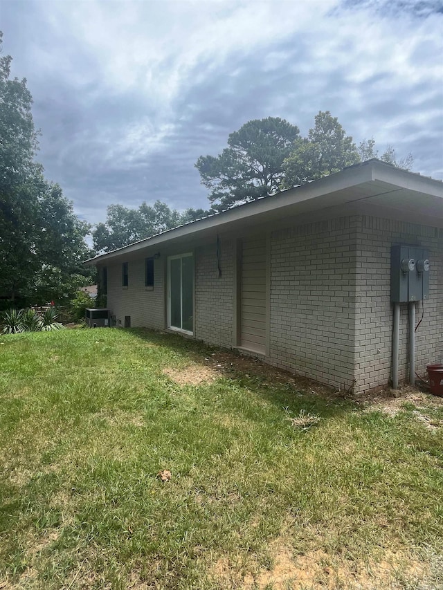 view of home's exterior featuring a lawn