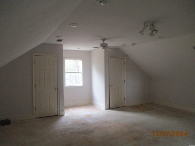 bonus room with vaulted ceiling and ceiling fan