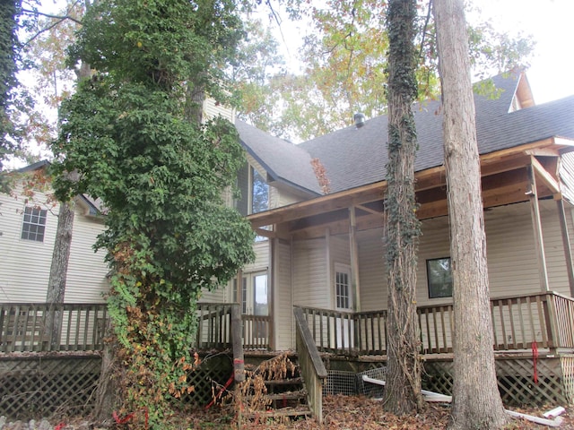 rear view of property with a deck