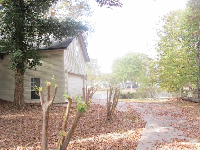 view of yard with a garage