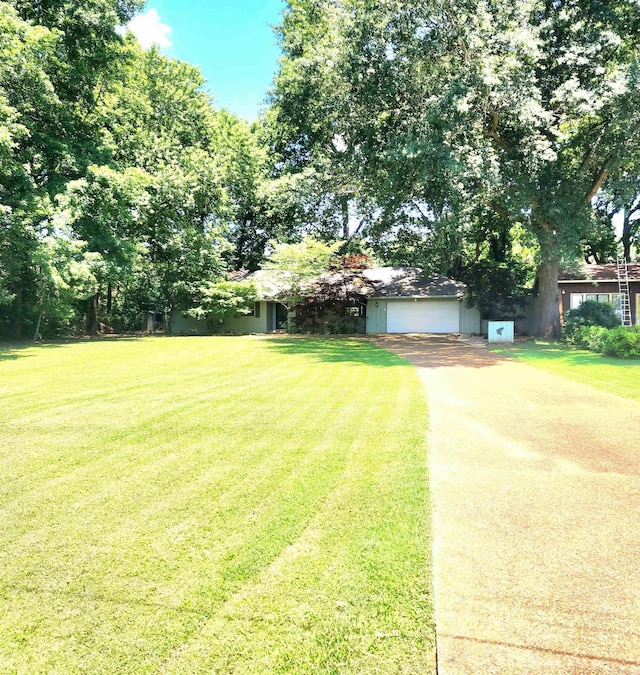 exterior space featuring a front lawn