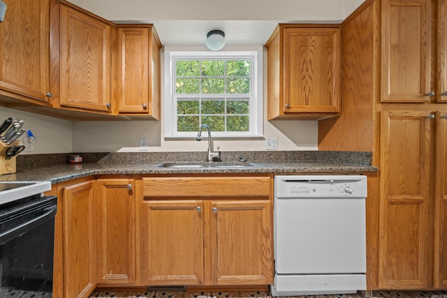 kitchen featuring dishwasher, sink, and black range with electric stovetop