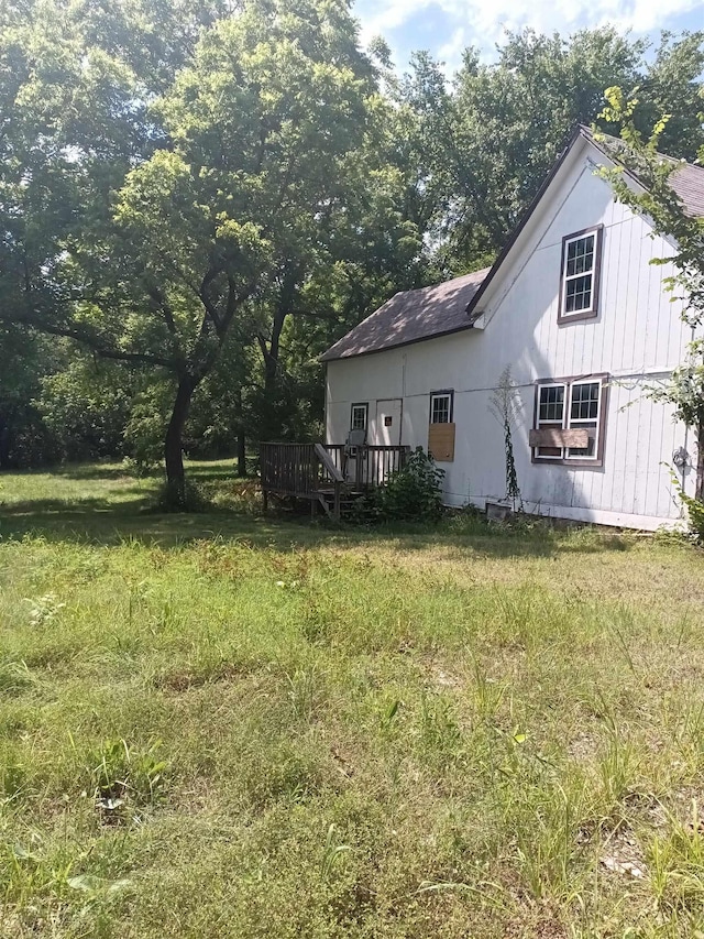 view of yard featuring a wooden deck