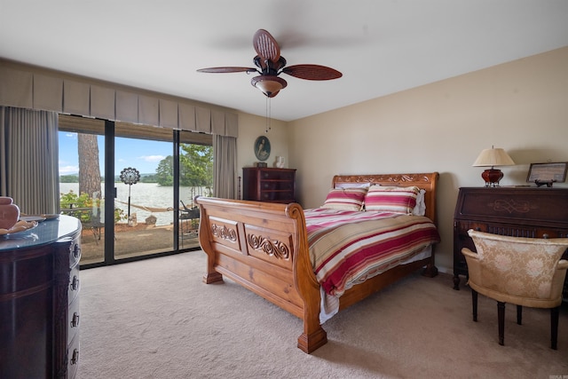 bedroom with ceiling fan, light colored carpet, and access to outside