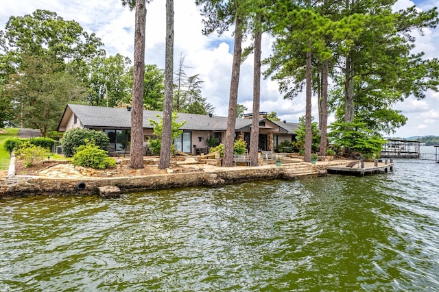 exterior space with a water view