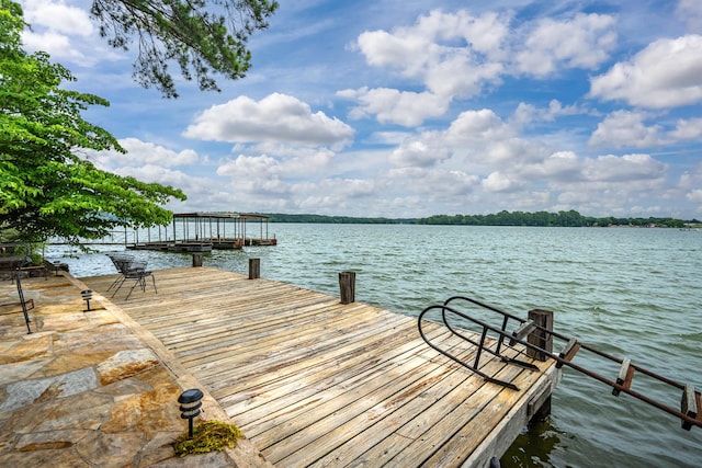 dock area with a water view