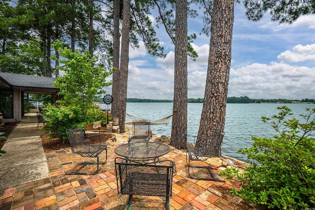 view of patio / terrace featuring a water view