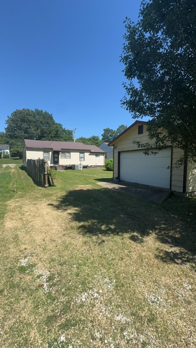 view of yard featuring a garage