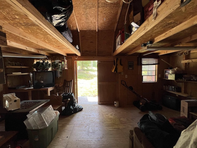 garage with wood walls