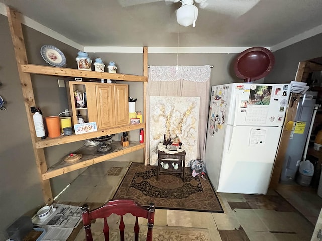 kitchen featuring tile patterned flooring and white refrigerator