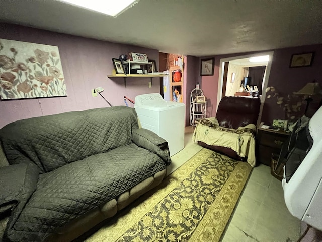 bedroom featuring washer / dryer