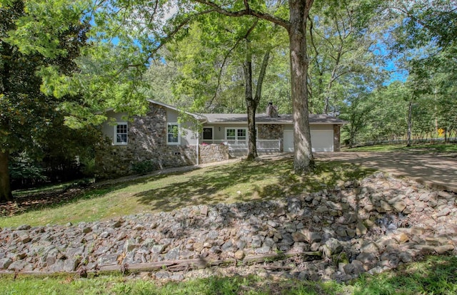 single story home featuring a garage