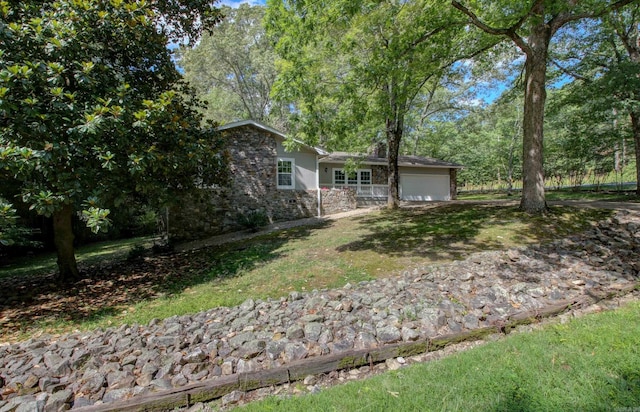 view of yard with a garage