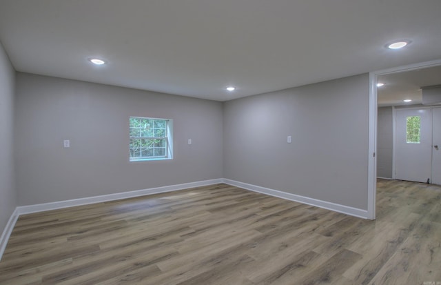 unfurnished room featuring light wood-type flooring