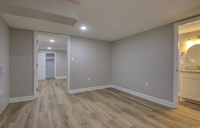 unfurnished room with light hardwood / wood-style floors