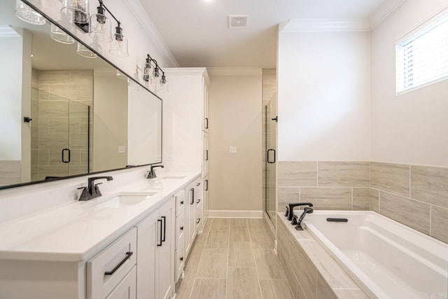 bathroom with vanity, ornamental molding, and plus walk in shower